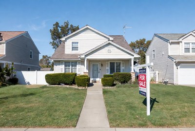 White House for Sale with Sign