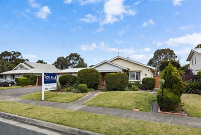 House for Sale with Sign