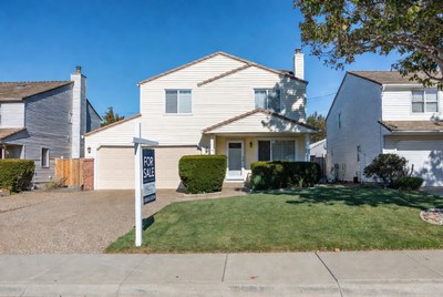 For Sale House with White Sign