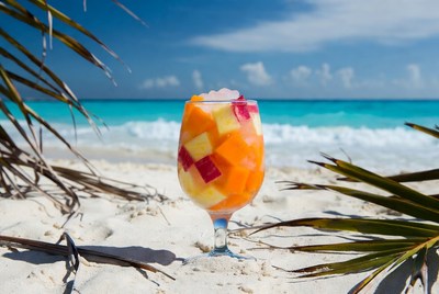 Fruit Salad Glass on Tropical Beach