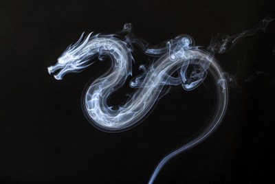 White Dragon Smoke on Black Background
