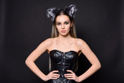 Woman in black corset with wolf ears