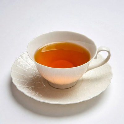 Teacup with Saucer on White Background