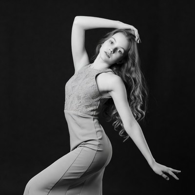 Young woman posing in lace dress