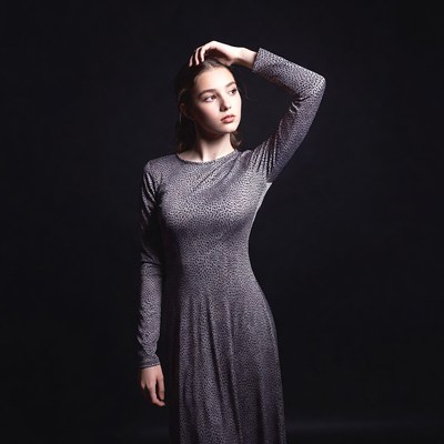 Young woman in leopard print dress