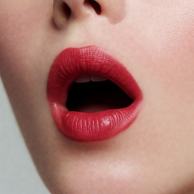 Woman with red lipstick open mouth