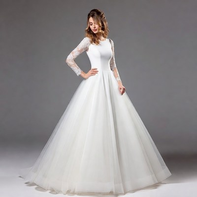 Woman in Long-Sleeve Lace Wedding Dress