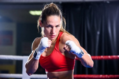 Female boxer in red sports bra