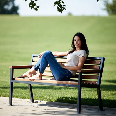 Woman relaxing on park bench