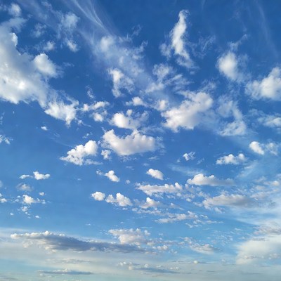 Fluffy Clouds in Blue Sky