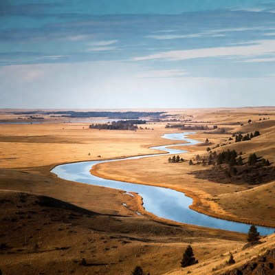 Winding River in Golden Grassland