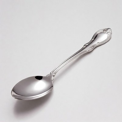 Silver Spoon on White Background