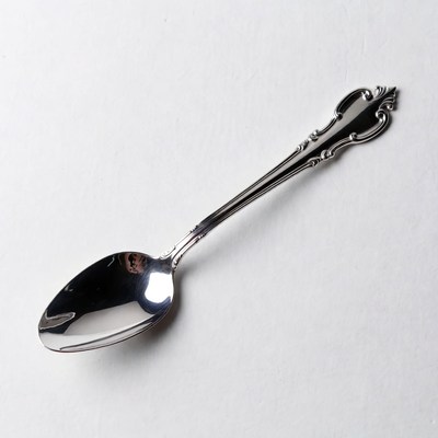 Elegant Silver Teaspoon on White Background