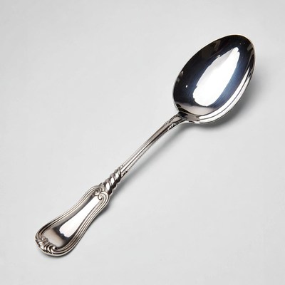 Silver serving spoon isolated