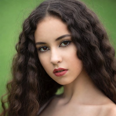 Beautiful woman with curly brown hair