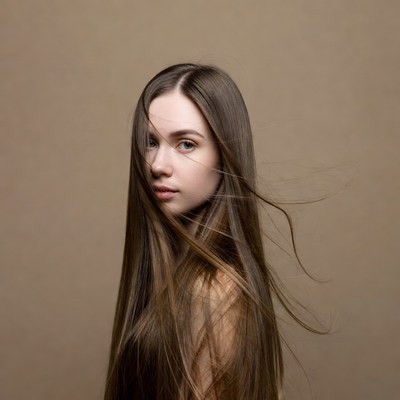 Woman with flowing long brown hair