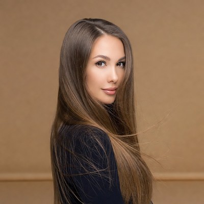 Woman with long brown hair profile
