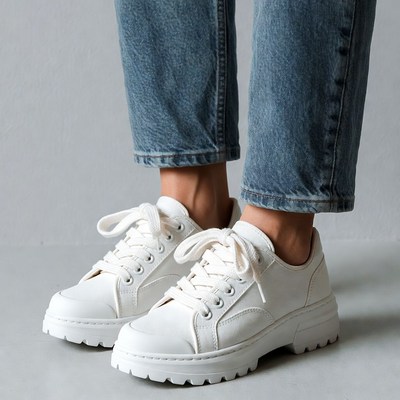 White platform sneakers with jeans