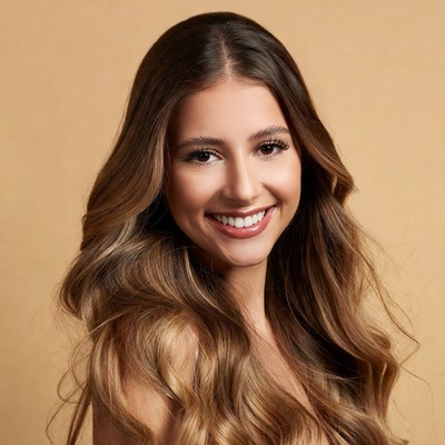Smiling woman with long brown hair