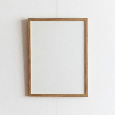 Empty Wooden Frame on White Wall