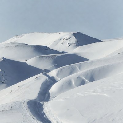 Snowy Mountain Peaks with Trail