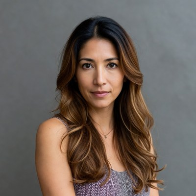 Latina woman with long wavy hair