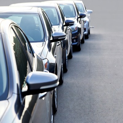 Row of Parked Silver Cars