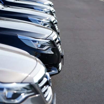 Row of Parked Cars Dealership
