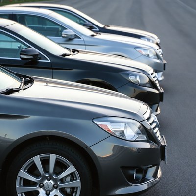 Row of Parked Cars on Road