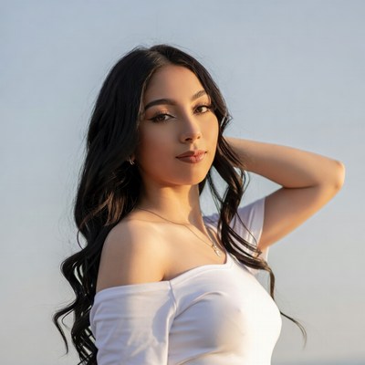 Latina woman with long hair smiling