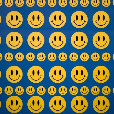 Yellow Smiley Faces on Blue Background