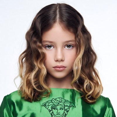 Girl in green Versace dress