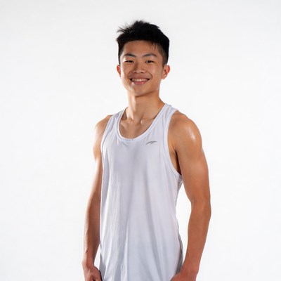 Smiling Asian young man in white tank top
