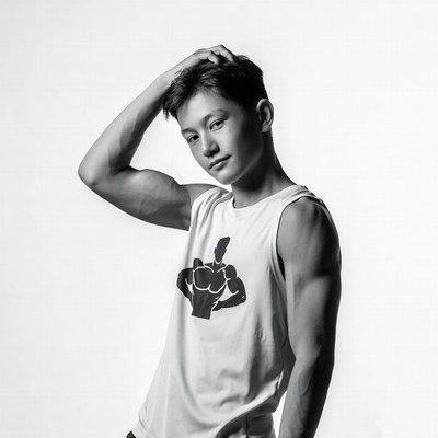 Asian man posing in muscle tank top