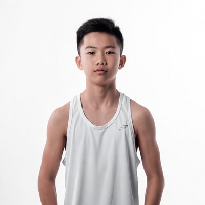 Asian boy in white tank top