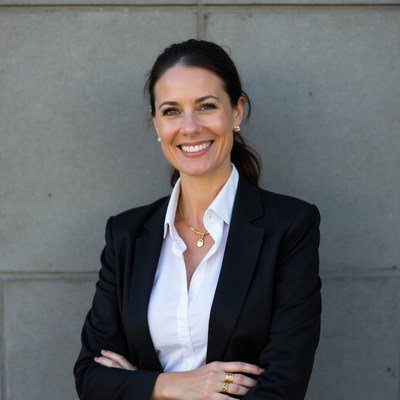 Smiling woman in black blazer suit