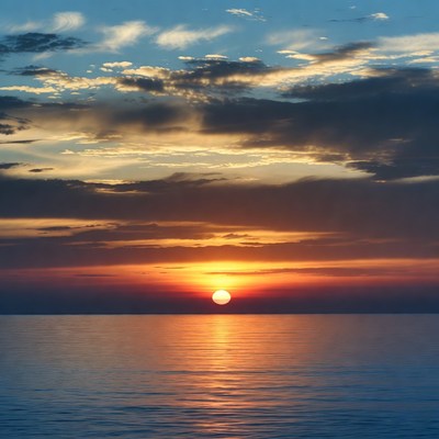 Sunset over calm ocean water