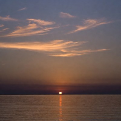 Sunset over calm ocean water