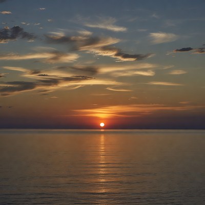 Sunset over calm ocean water