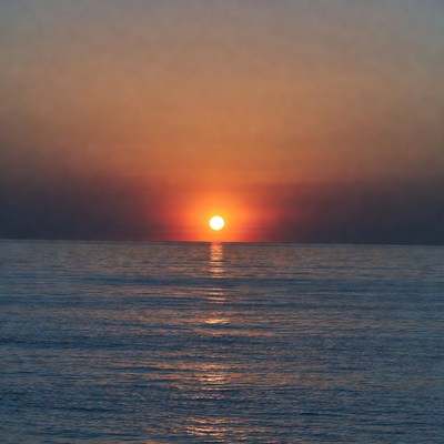 Sunset over calm ocean