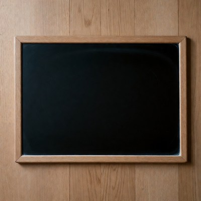 Empty wooden-framed blackboard on wood wall