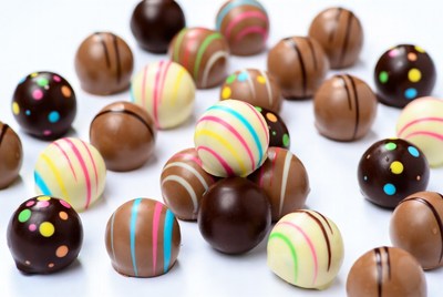 Colorful Chocolate Truffles on White Background