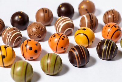 Colorful Chocolate Truffles on White Background