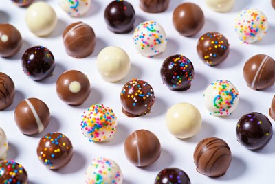 Colorful Chocolate Truffles on White Background