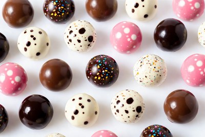Colorful Chocolate Truffles on White Background