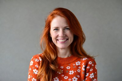 Smiling woman with red hair