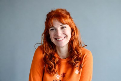 Smiling woman with red hair