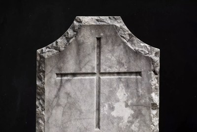 Stone Cross Gravestone on Black Background