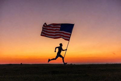 Man running with American flag silhouette