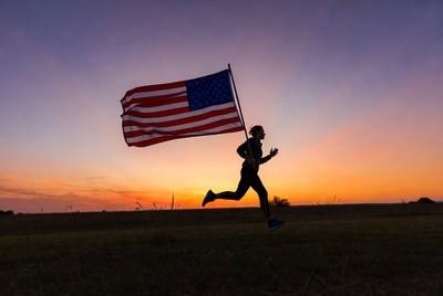 Man running with American flag silhouette